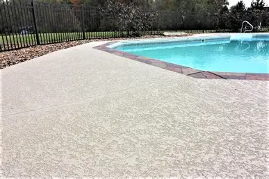 Spray deck installation around a swimming pool in Houston by R&L Spray Deck